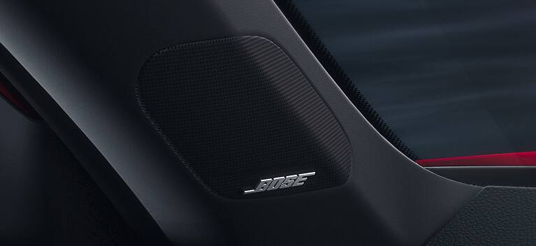 2027 Honda Civic Hatchback Sport Touring Hybrid detail of the Bose premium sound system speakers (Compact Hatchback).