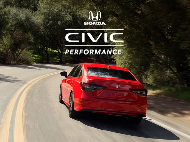 2027 Honda Civic Sedan Sport Touring Hybrid in Rallye Red front 3/4 view parked on rooftop with overlapping Civic Performance logo (Compact Sedan)